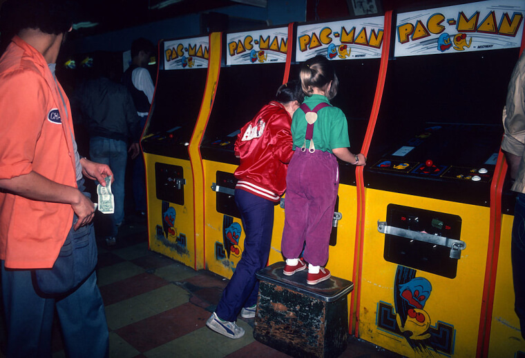 '​80s Kids Playing Pac-Man At An Arcade